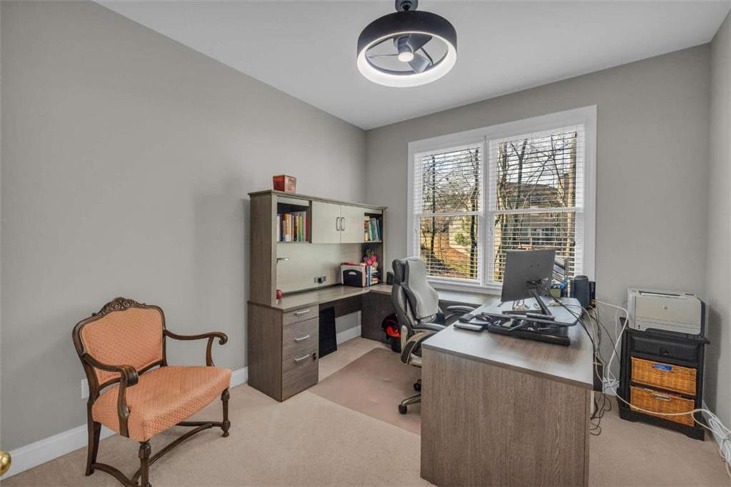 3540 Sentry View Trace Suwanee, GA 30024 - Photo 13 of 70 a room with furniture and a window