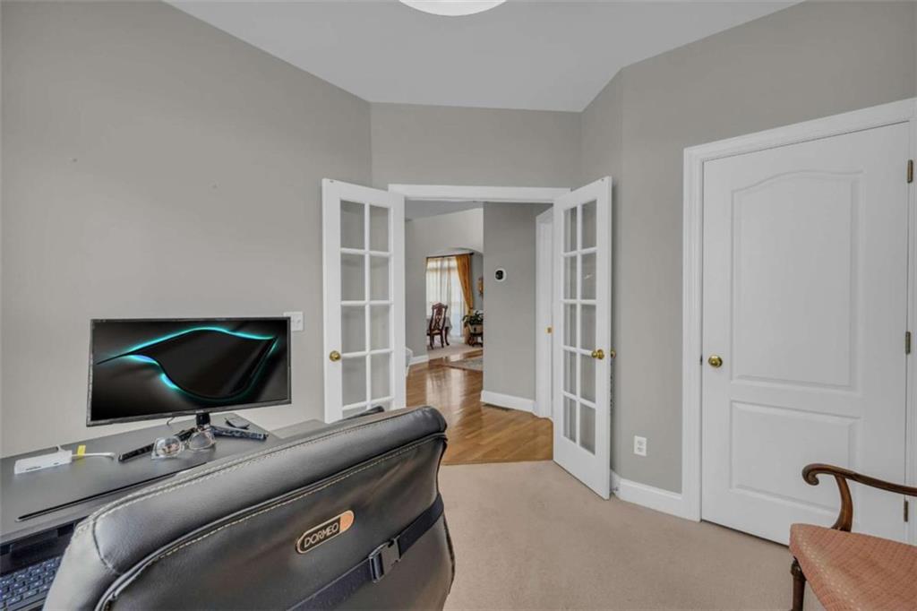 3540 Sentry View Trace Suwanee, GA 30024 - Photo 14 of 70 a living room with furniture and a flat screen tv