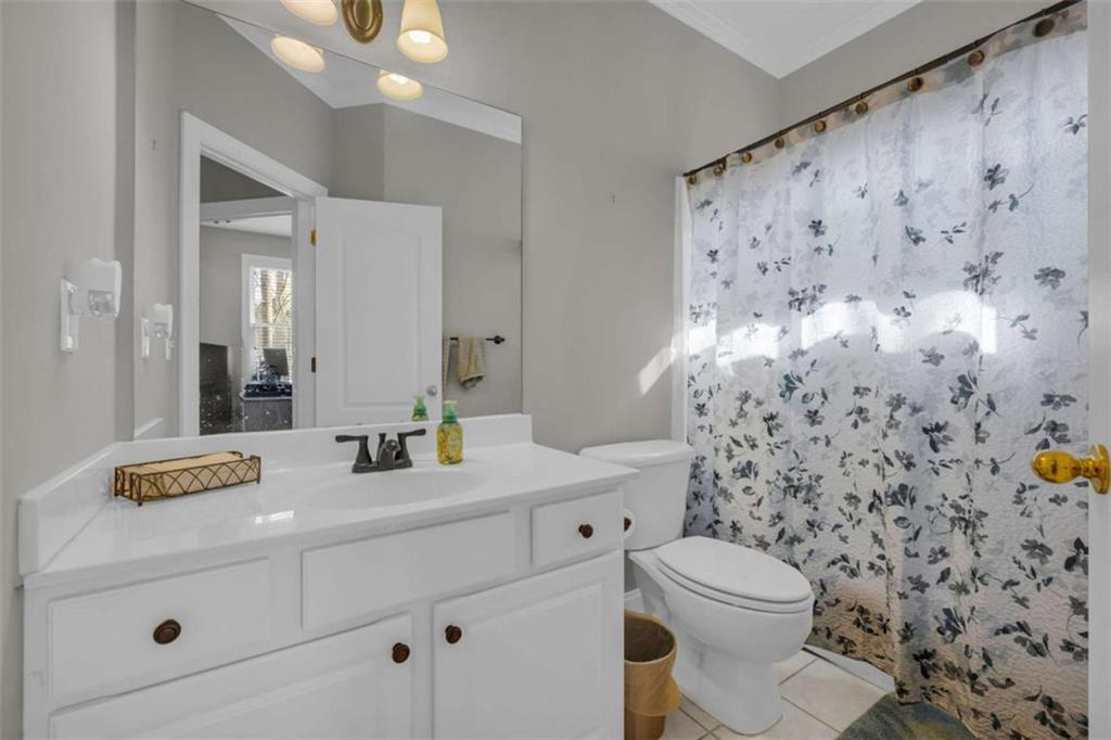3540 Sentry View Trace Suwanee, GA 30024 - Photo 15 of 70 a bathroom with a sink toilet and shower