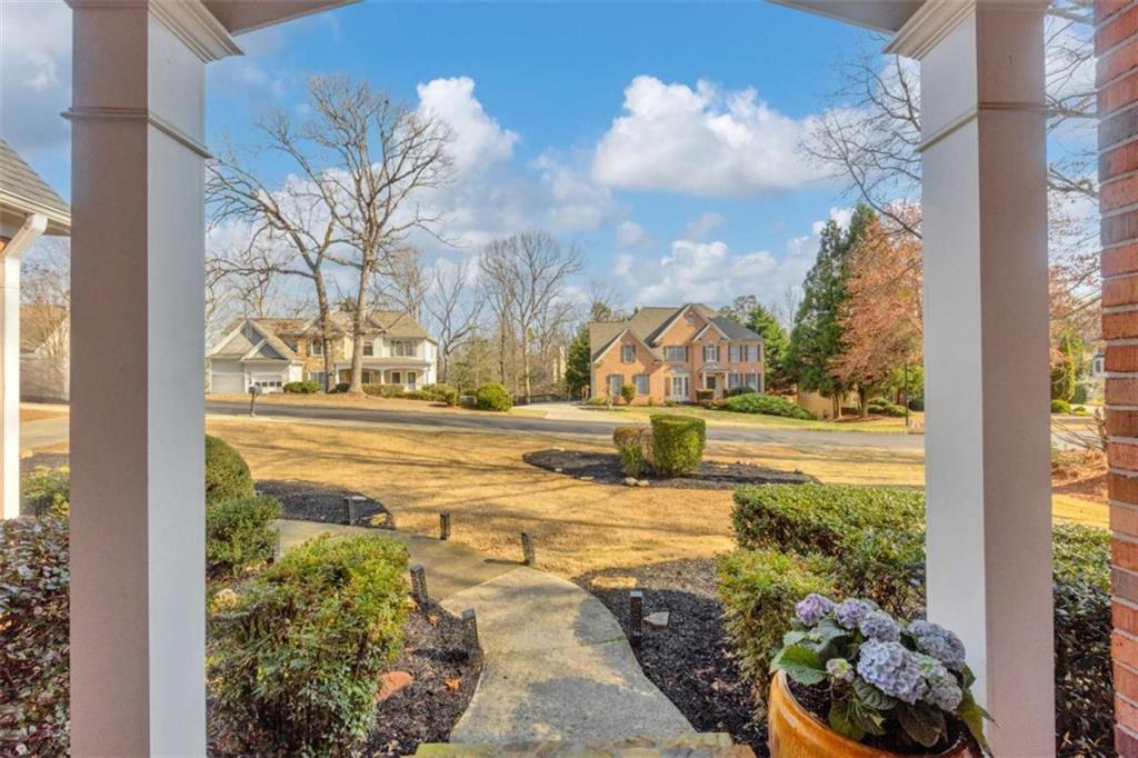 3540 Sentry View Trace Suwanee, GA 30024 - Photo 4 of 70 a view of yard with fountain in front of door