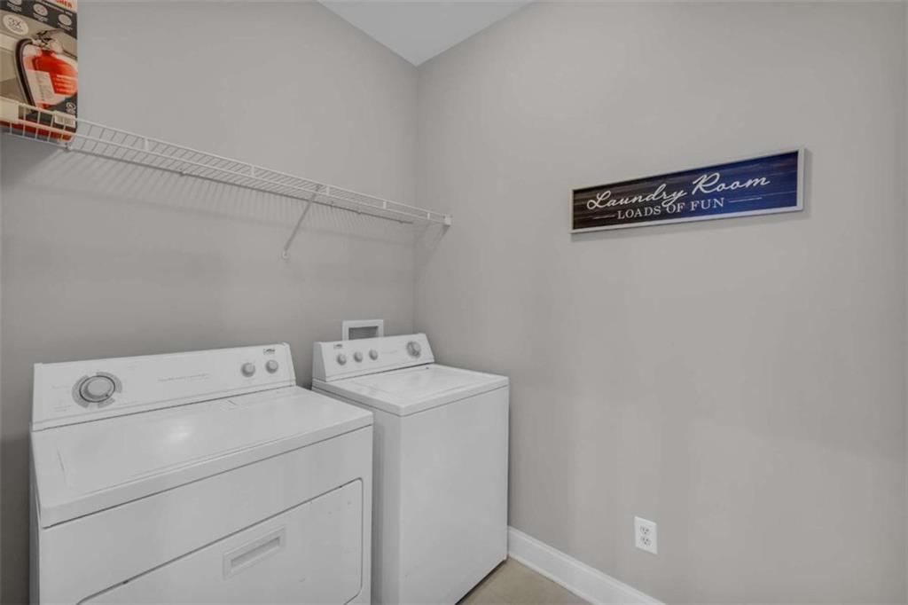 3540 Sentry View Trace Suwanee, GA 30024 - Photo 44 of 70 a utility room with dryer and washer