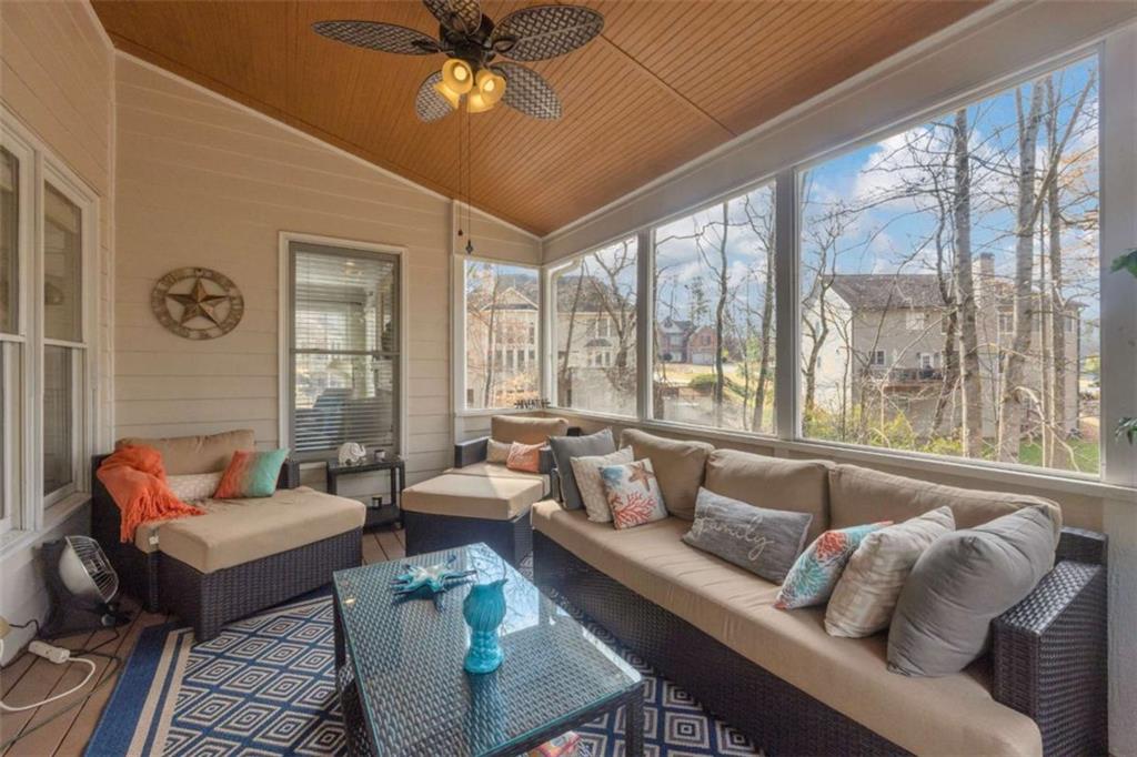 3540 Sentry View Trace Suwanee, GA 30024 - Photo 46 of 70 a living room with furniture and a large window