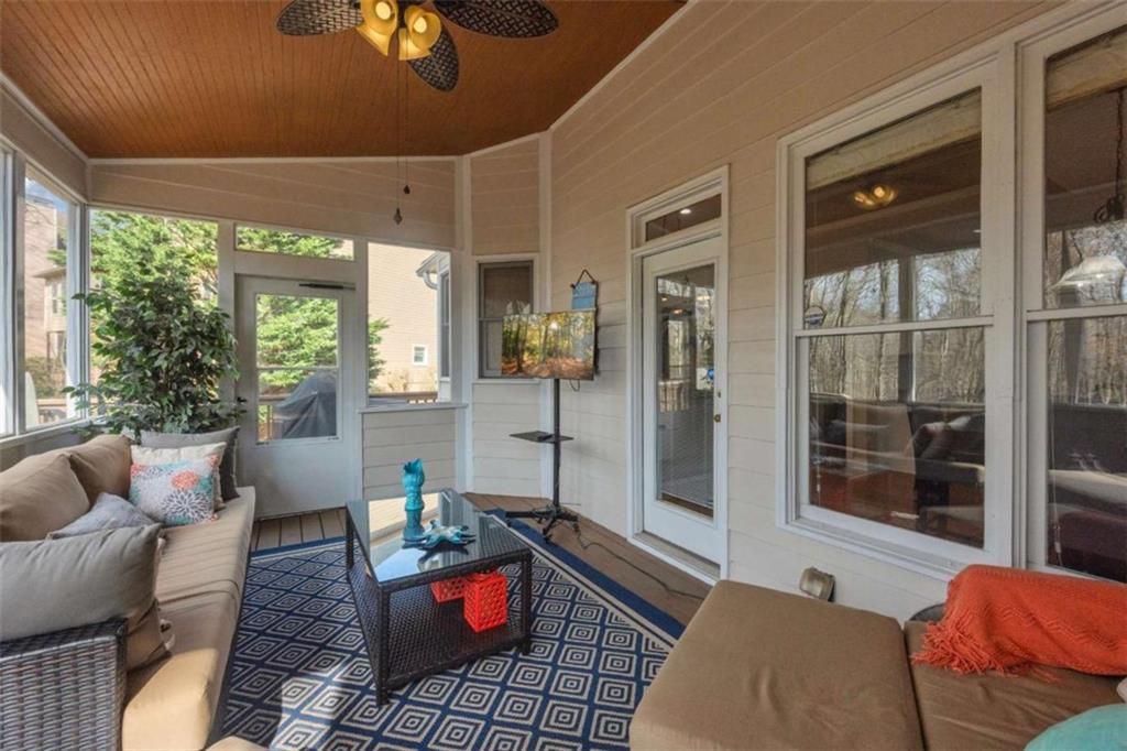 3540 Sentry View Trace Suwanee, GA 30024 - Photo 47 of 70 a living room with furniture and a table