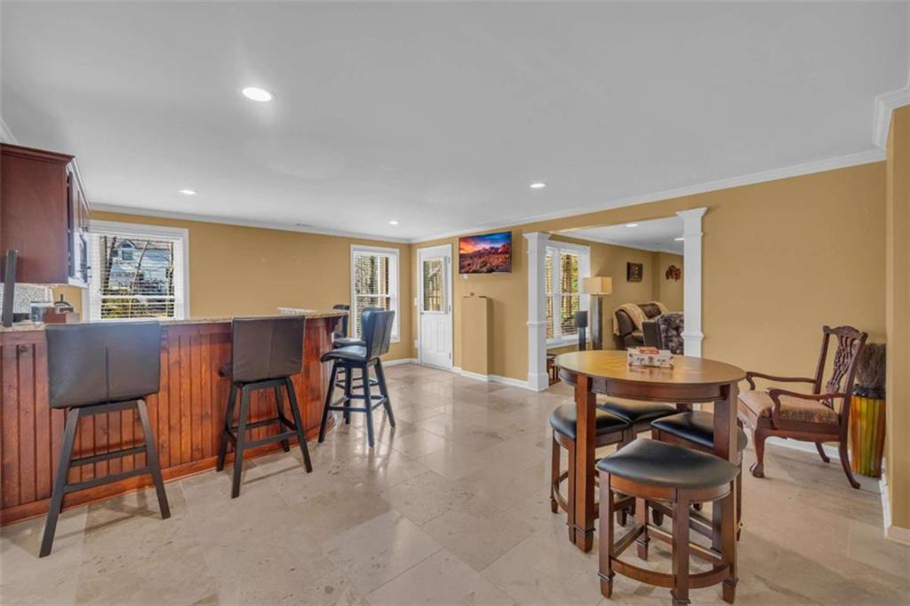 3540 Sentry View Trace Suwanee, GA 30024 - Photo 48 of 70 a view of a dining room with furniture