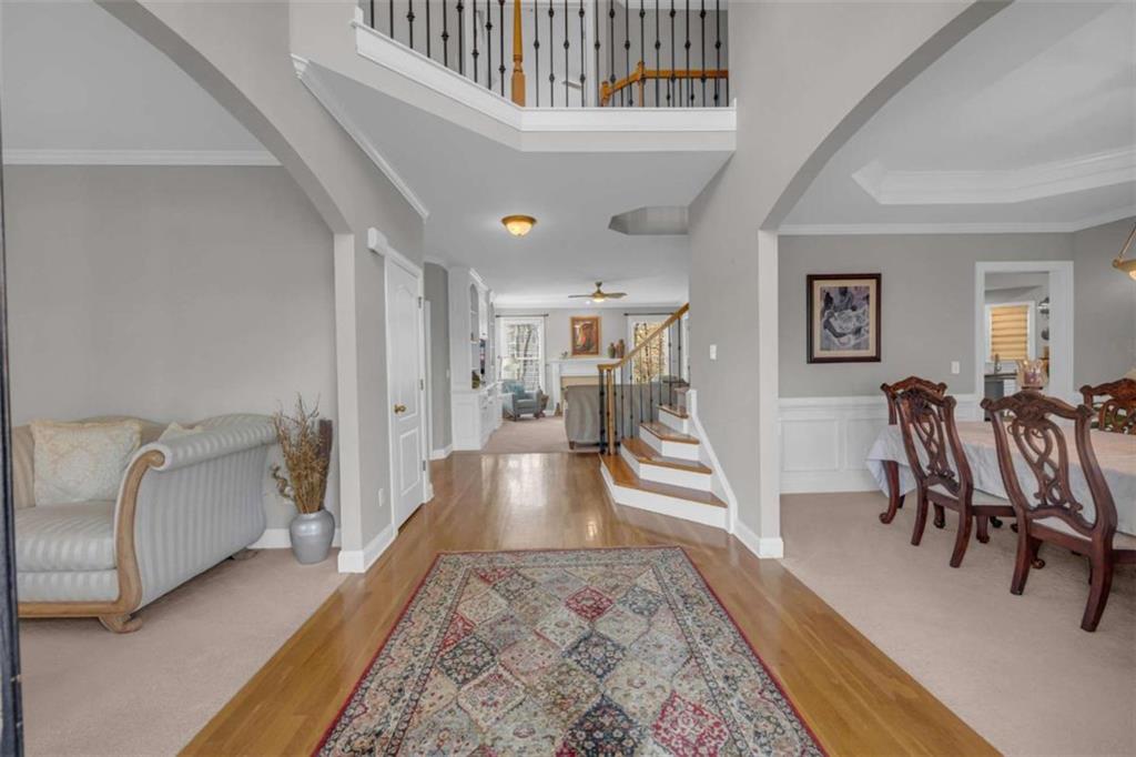 3540 Sentry View Trace Suwanee, GA 30024 - Photo 5 of 70 a living room with furniture and a wooden floor