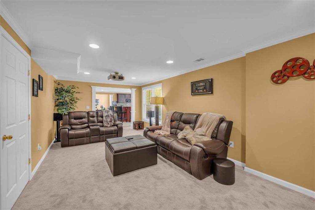 3540 Sentry View Trace Suwanee, GA 30024 - Photo 54 of 70 a living room with furniture and a table