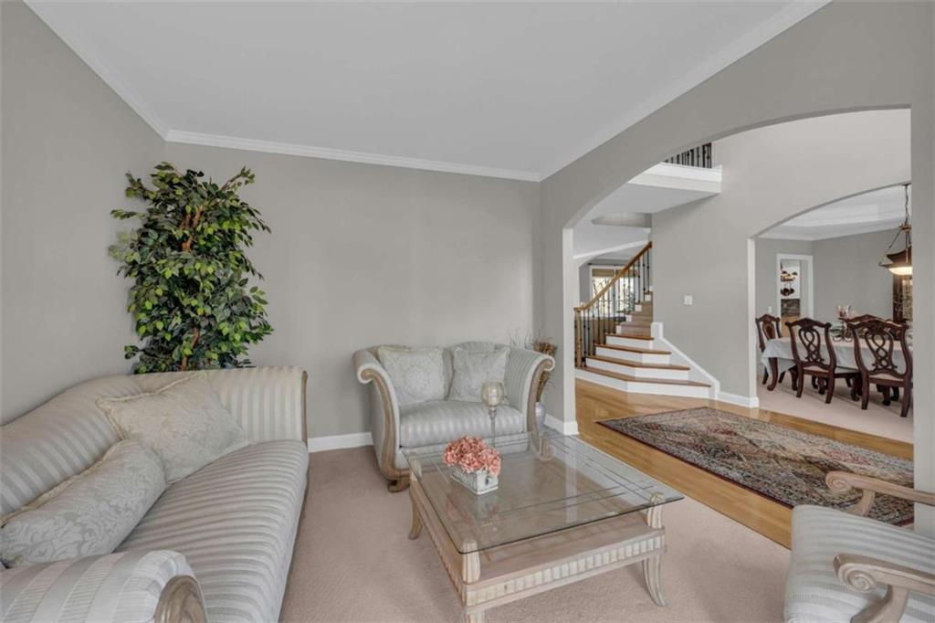 3540 Sentry View Trace Suwanee, GA 30024 - Photo 6 of 70 a living room with furniture and a couch