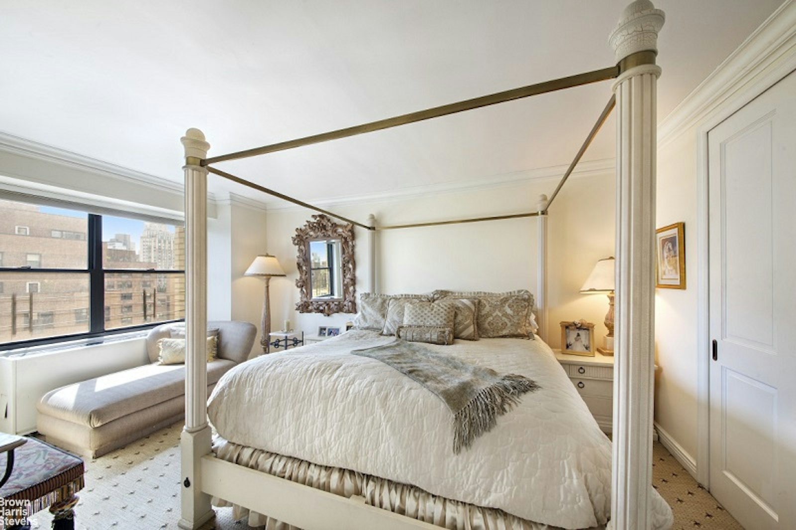 345 East 80th Street, Unit 19EF Manhattan, NY 10075 - Photo 19 of 32 a bedroom with a large bed and a large window