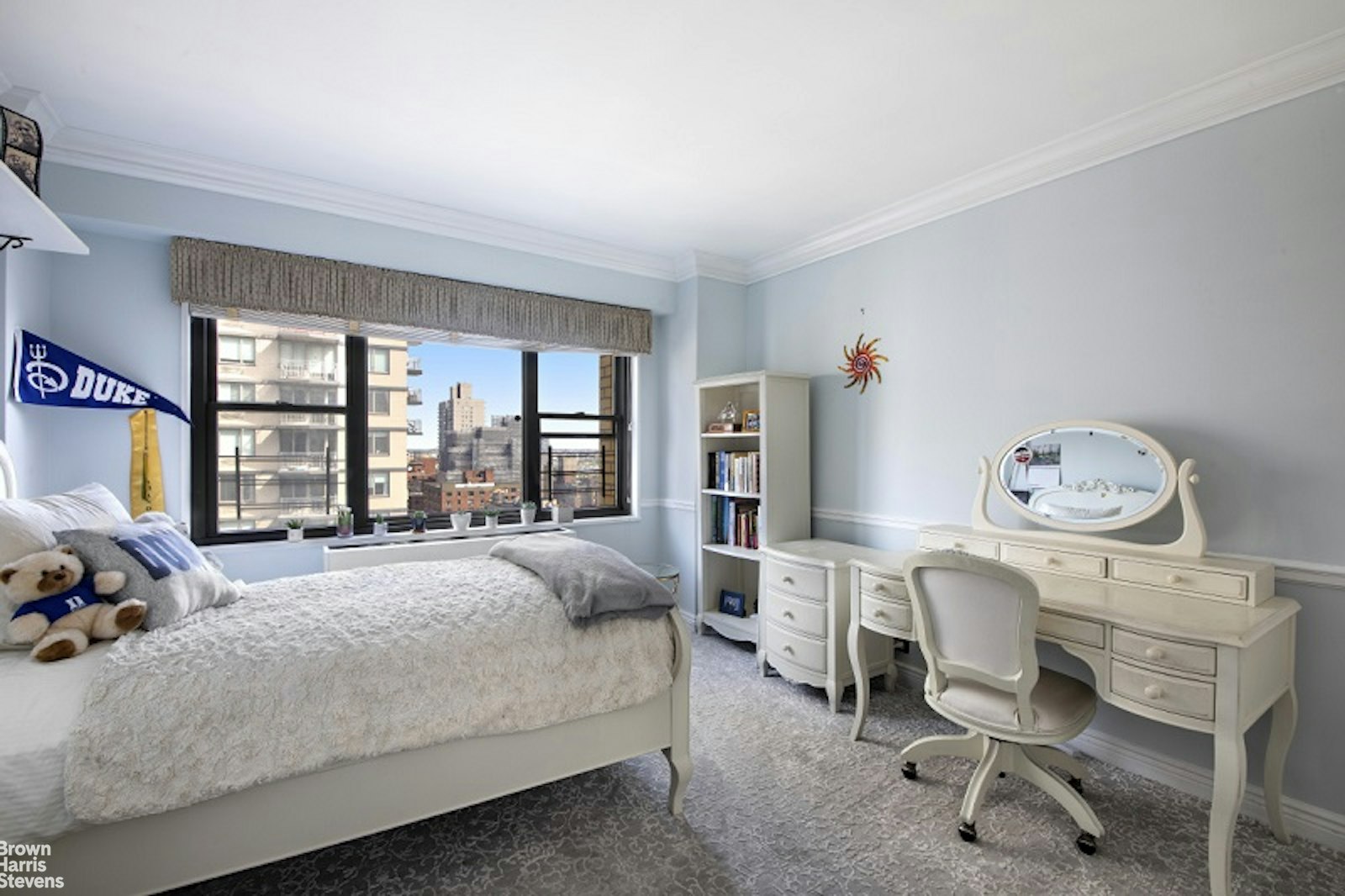 345 East 80th Street, Unit 19EF Manhattan, NY 10075 - Photo 27 of 32 a bed room with furniture and a window