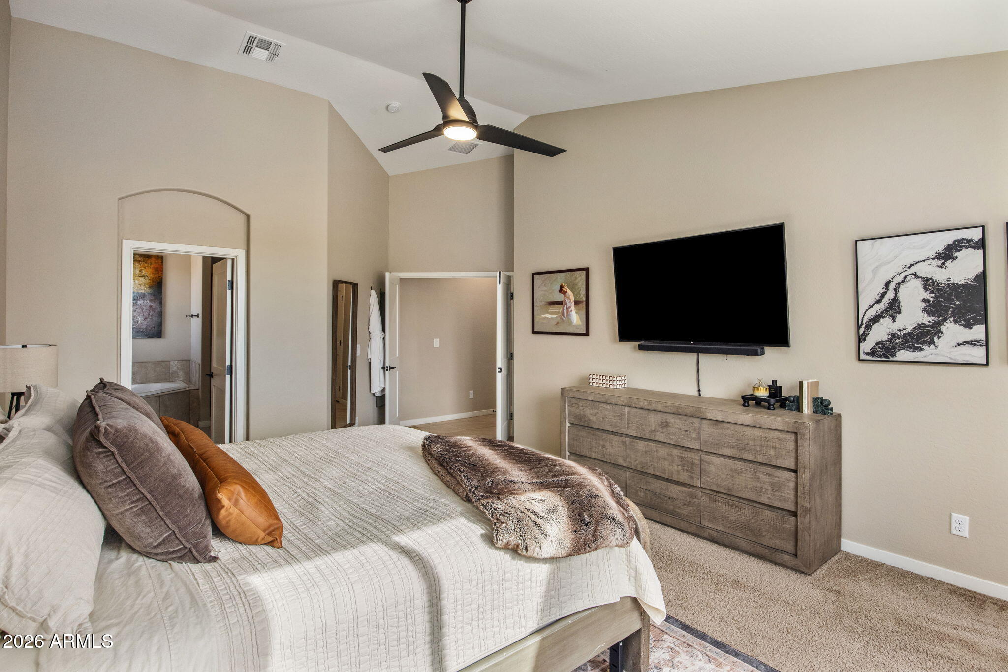 27412 North 170th Street Rio Verde, AZ 85263 - Photo 13 of 28 a bedroom with a bed and a flat screen tv on dresser
