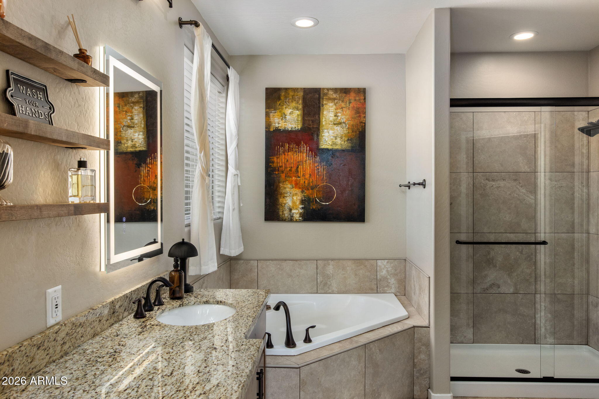 27412 North 170th Street Rio Verde, AZ 85263 - Photo 14 of 28 a bathroom with a tub and a sink