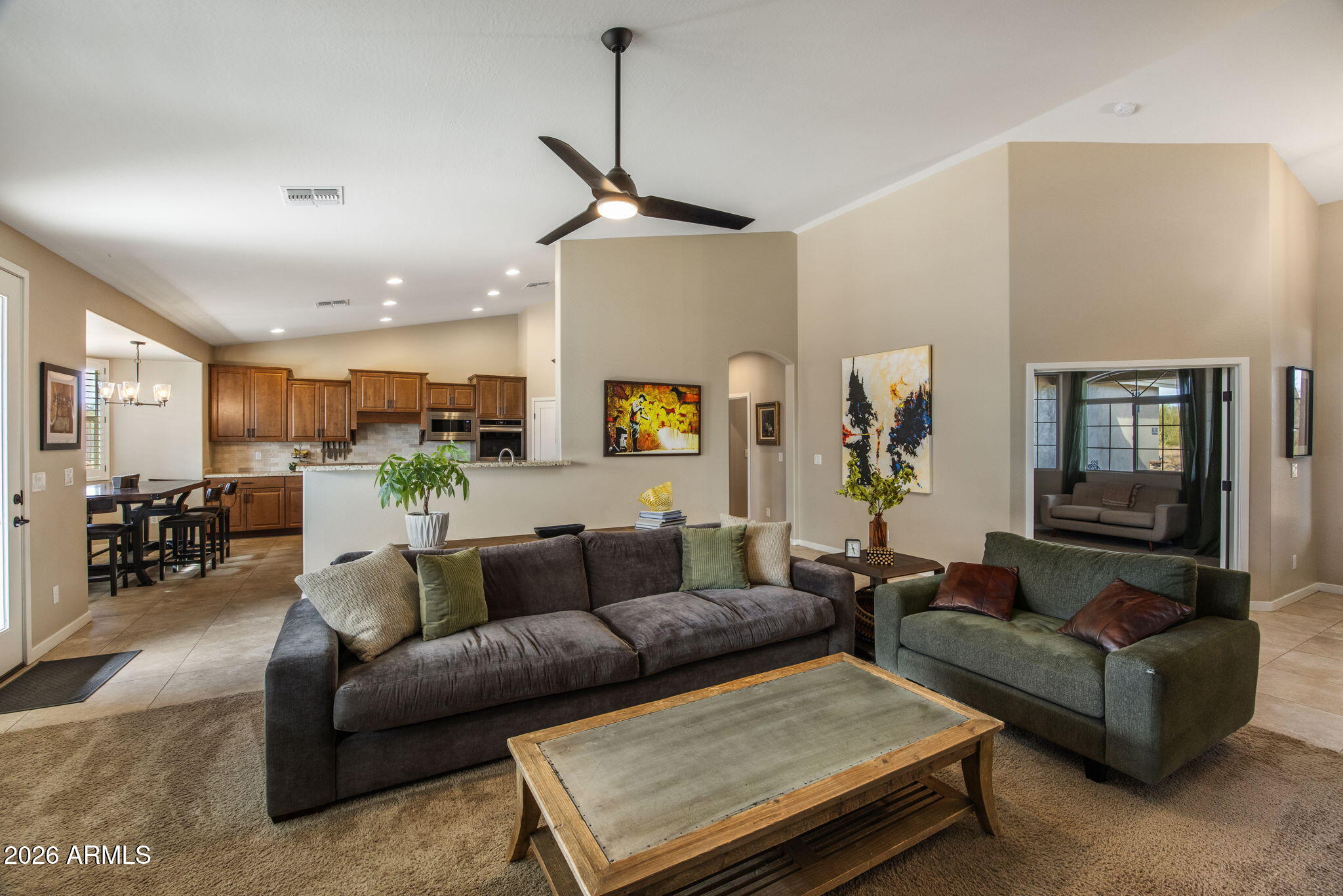 27412 North 170th Street Rio Verde, AZ 85263 - Photo 8 of 28 a living room with furniture and kitchen view