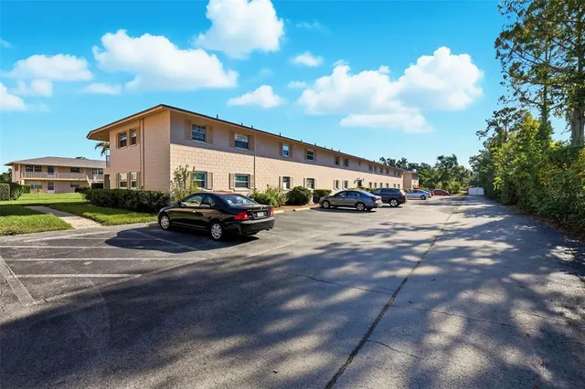 a view of car parked in front of house