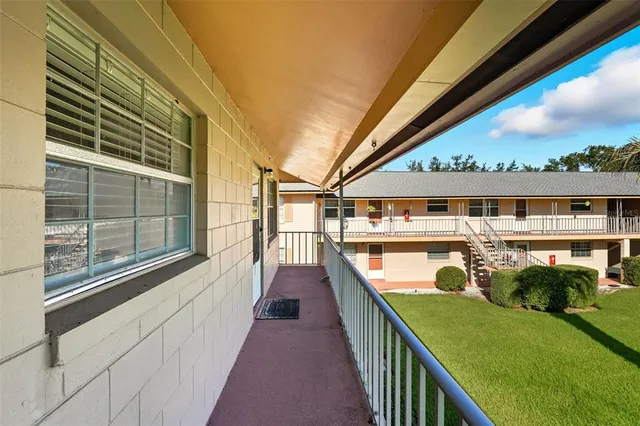a view of swimming pool with outdoor seating