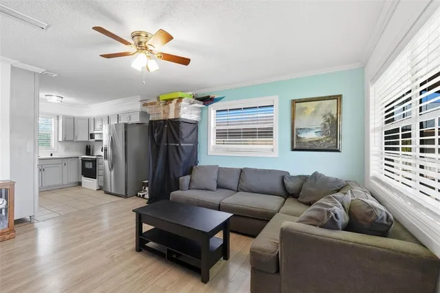 a living room with furniture and a window