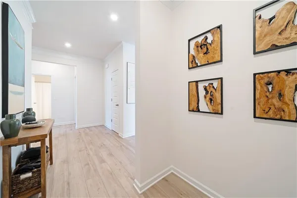a living room with furniture a table and a window