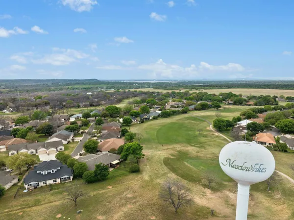 $699,000 | 407 Olympia Fields Street, Meadowlakes, TX 78654