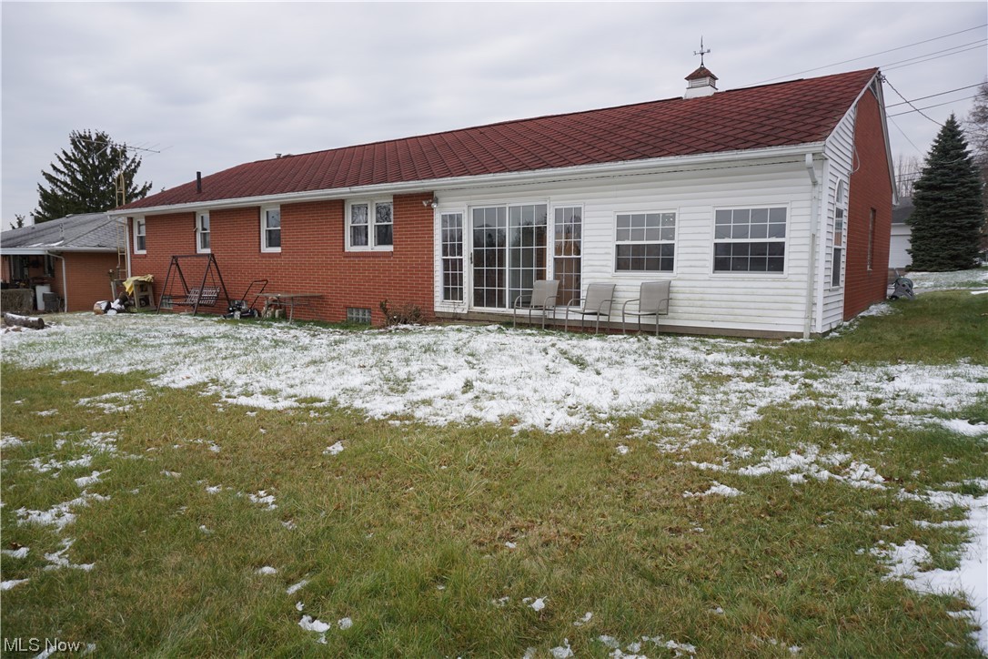 4611 8th Street Northwest Canton, OH 44708 - Photo 24 of 29 Snow covered back of property with a lawn
