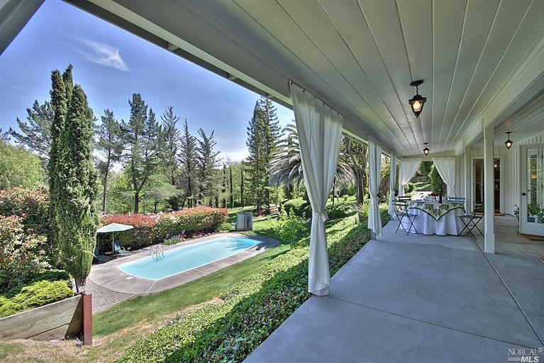 3380 Sullivan Road Sebastopol, CA 95472 - Photo 1 of 1 a view of a porch with furniture and a yard