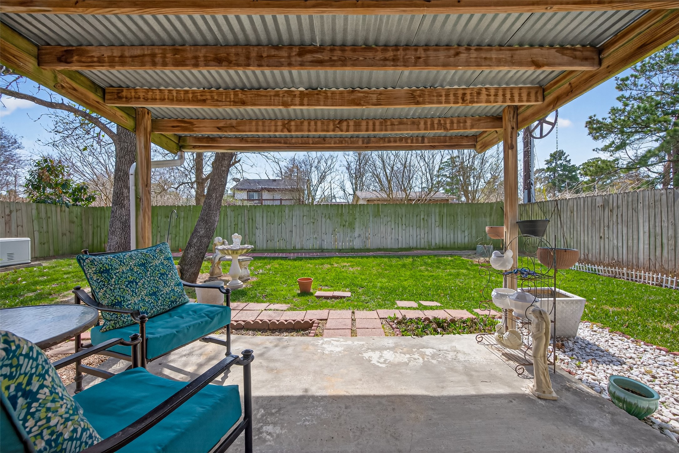 3639 Nutwood Lane Spring, TX 77389 - Photo 26 of 33 Relax on the inviting covered patio overlooking a lush backyard.