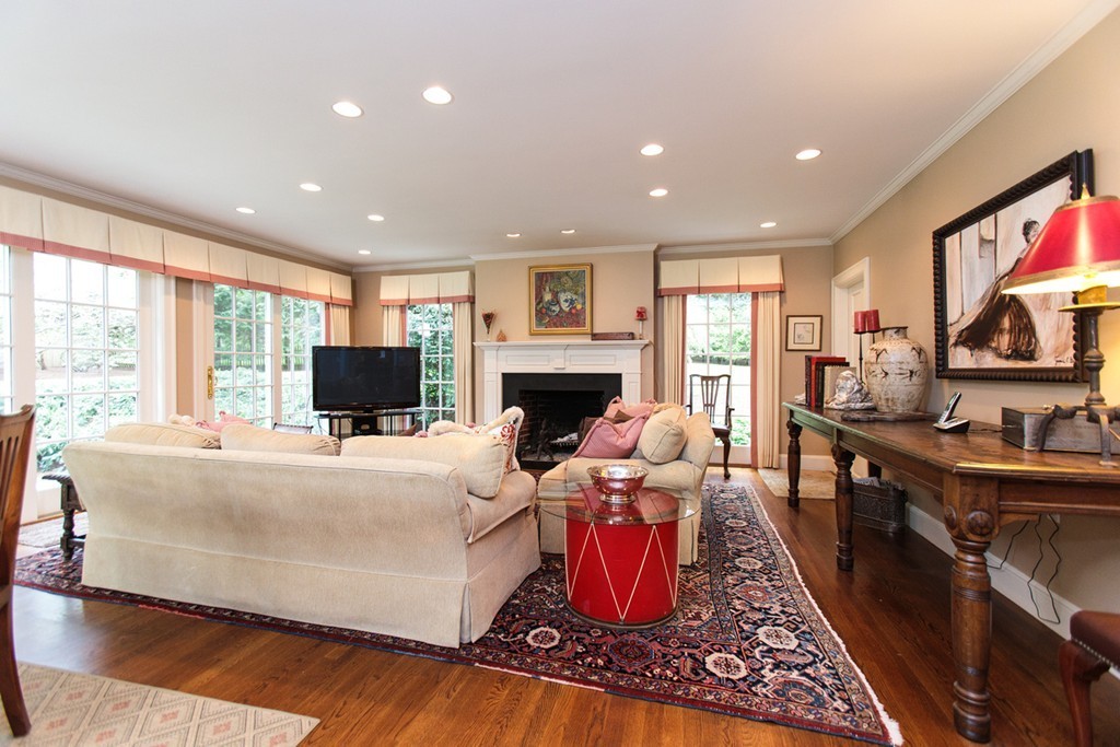 100 Hundreds Road Wellesley, MA 02481 - Photo 5 of 17 a living room with furniture fireplace and flat screen tv