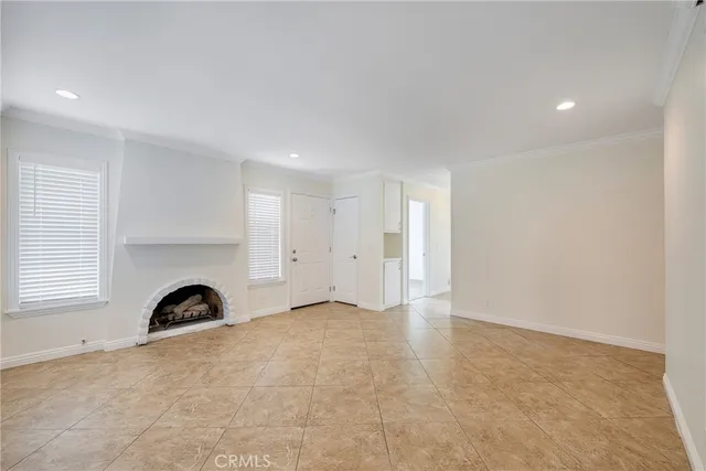 wooden floor with a fireplace