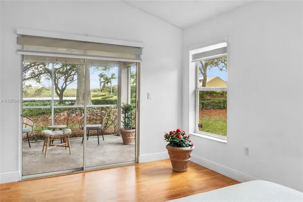 a room with furniture and a window