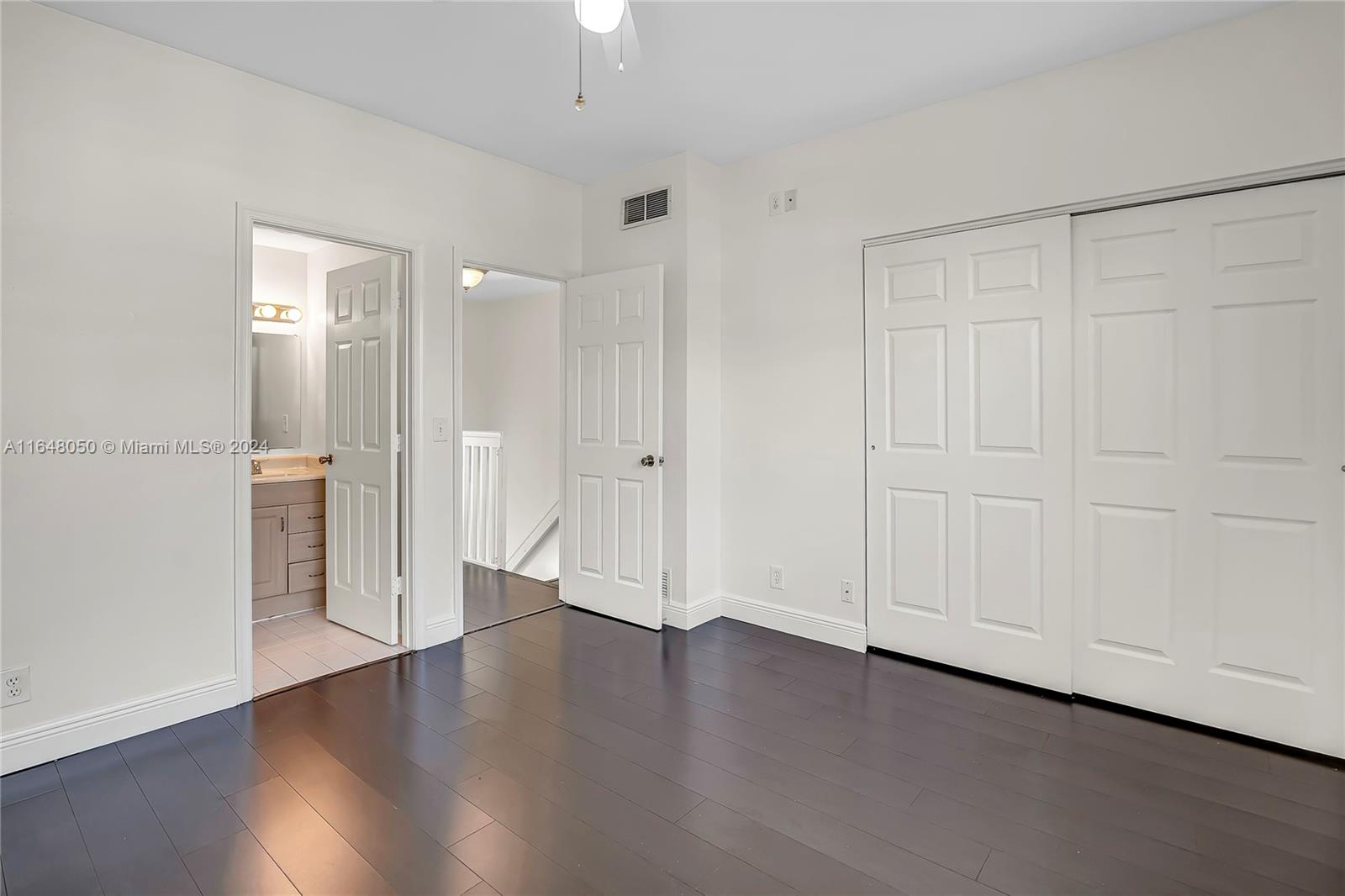 56 Truman Drive Weston, FL 33326 - Photo 12 of 24 an empty room with wooden floor