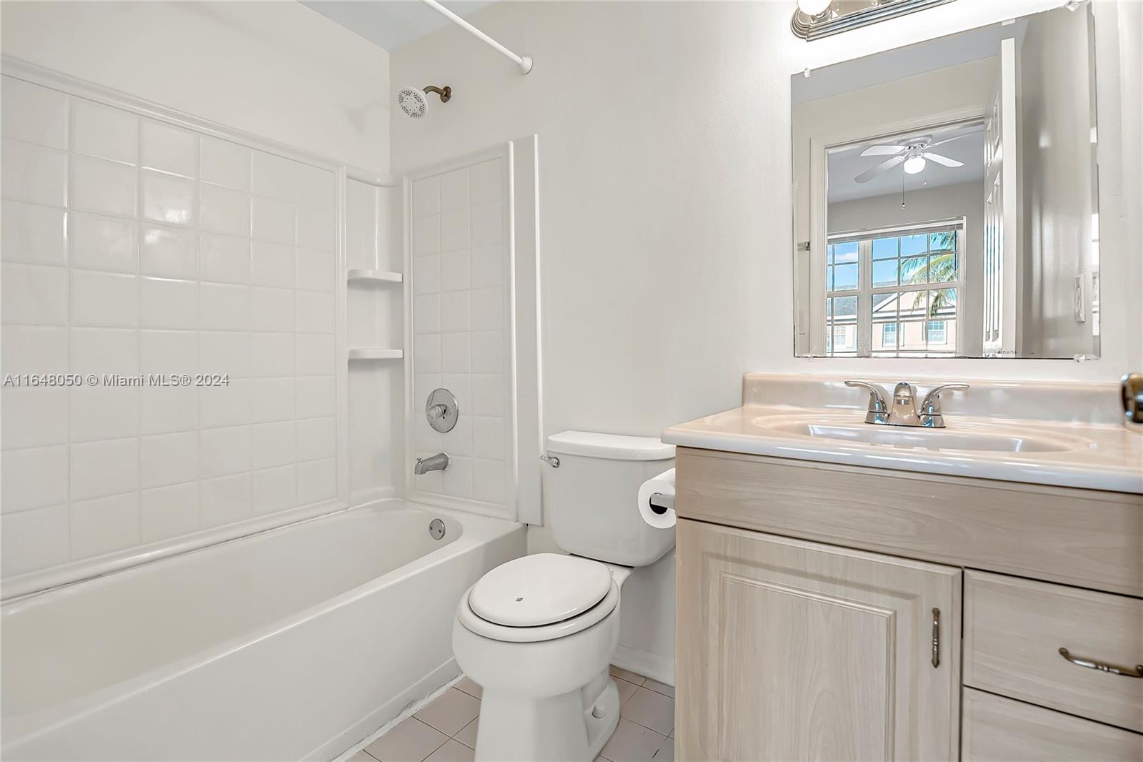 56 Truman Drive Weston, FL 33326 - Photo 14 of 24 a bathroom with a sink toilet and shower