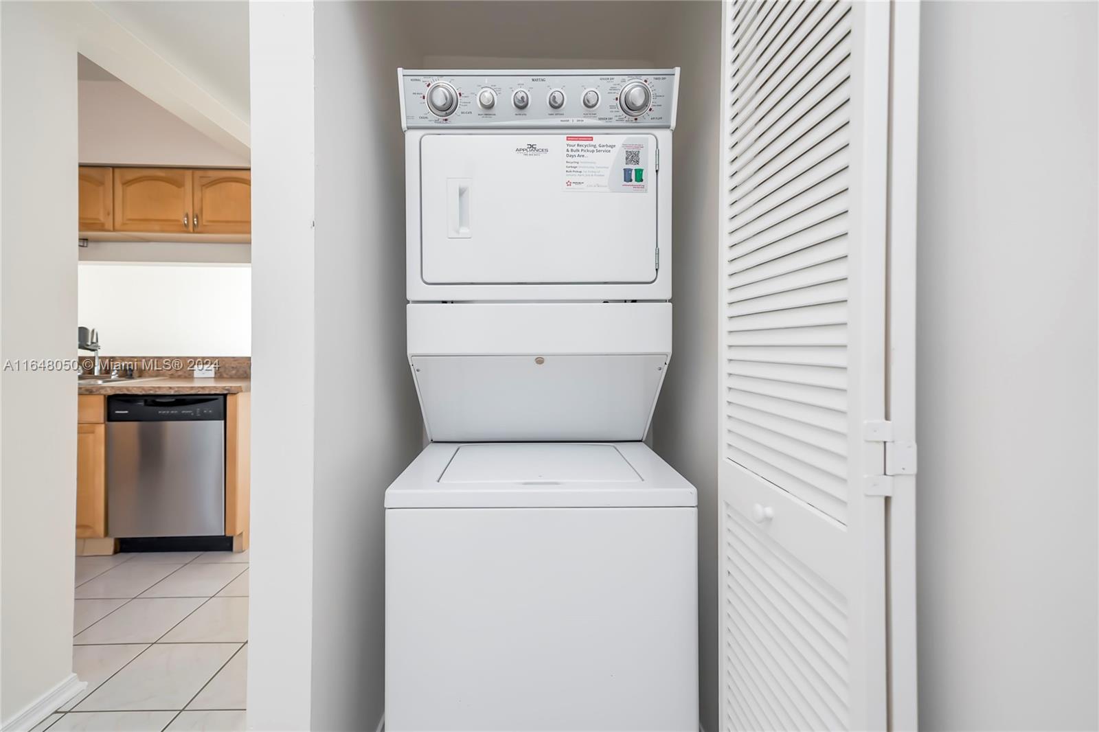 56 Truman Drive Weston, FL 33326 - Photo 20 of 24 a utility room with dryer and washer