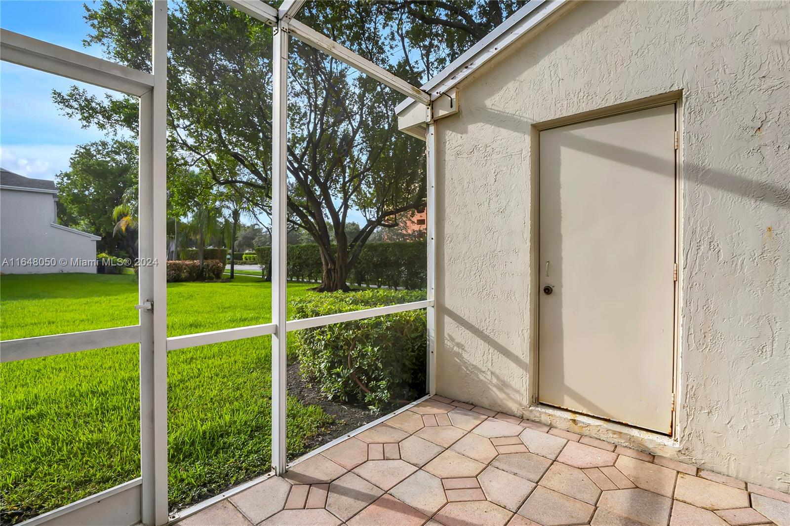 56 Truman Drive Weston, FL 33326 - Photo 22 of 24 a view of backyard with green space