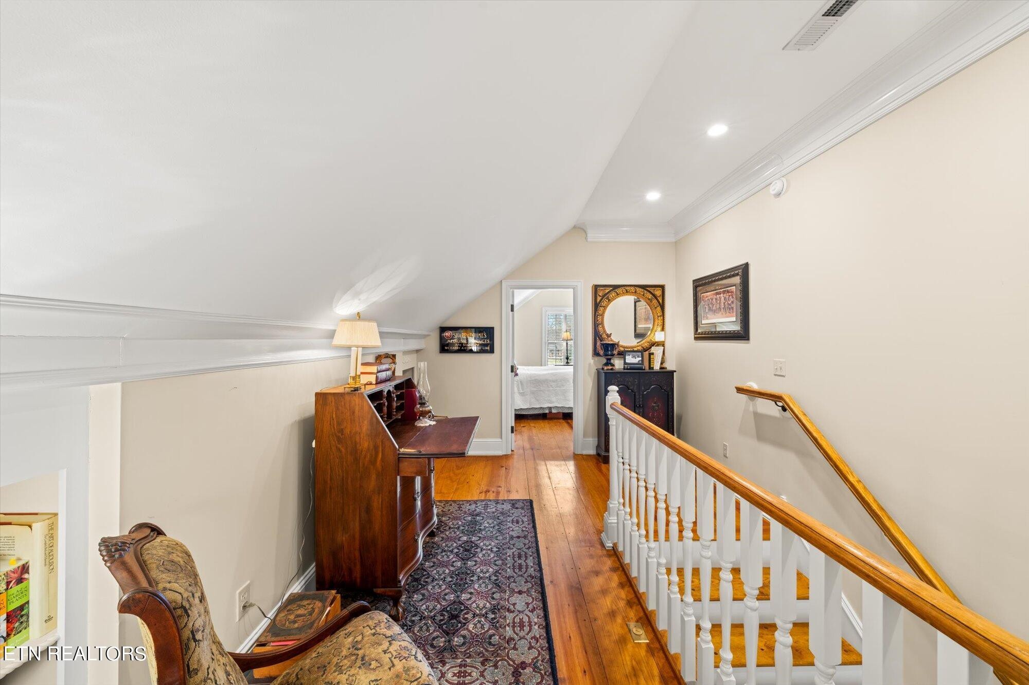 7016 Castlewood Road Knoxville, TN 37931 - Photo 35 of 58 a view of a livingroom with furniture and staircase
