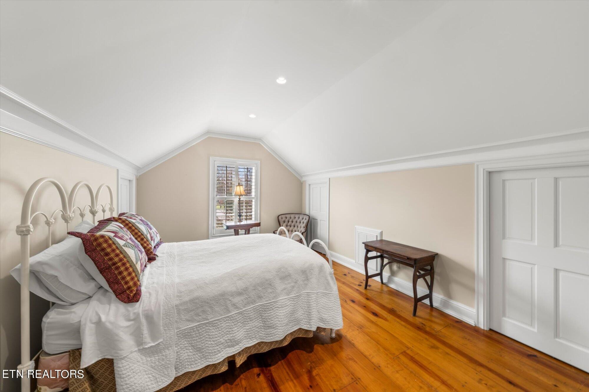 7016 Castlewood Road Knoxville, TN 37931 - Photo 42 of 58 a bedroom with a bed and a window