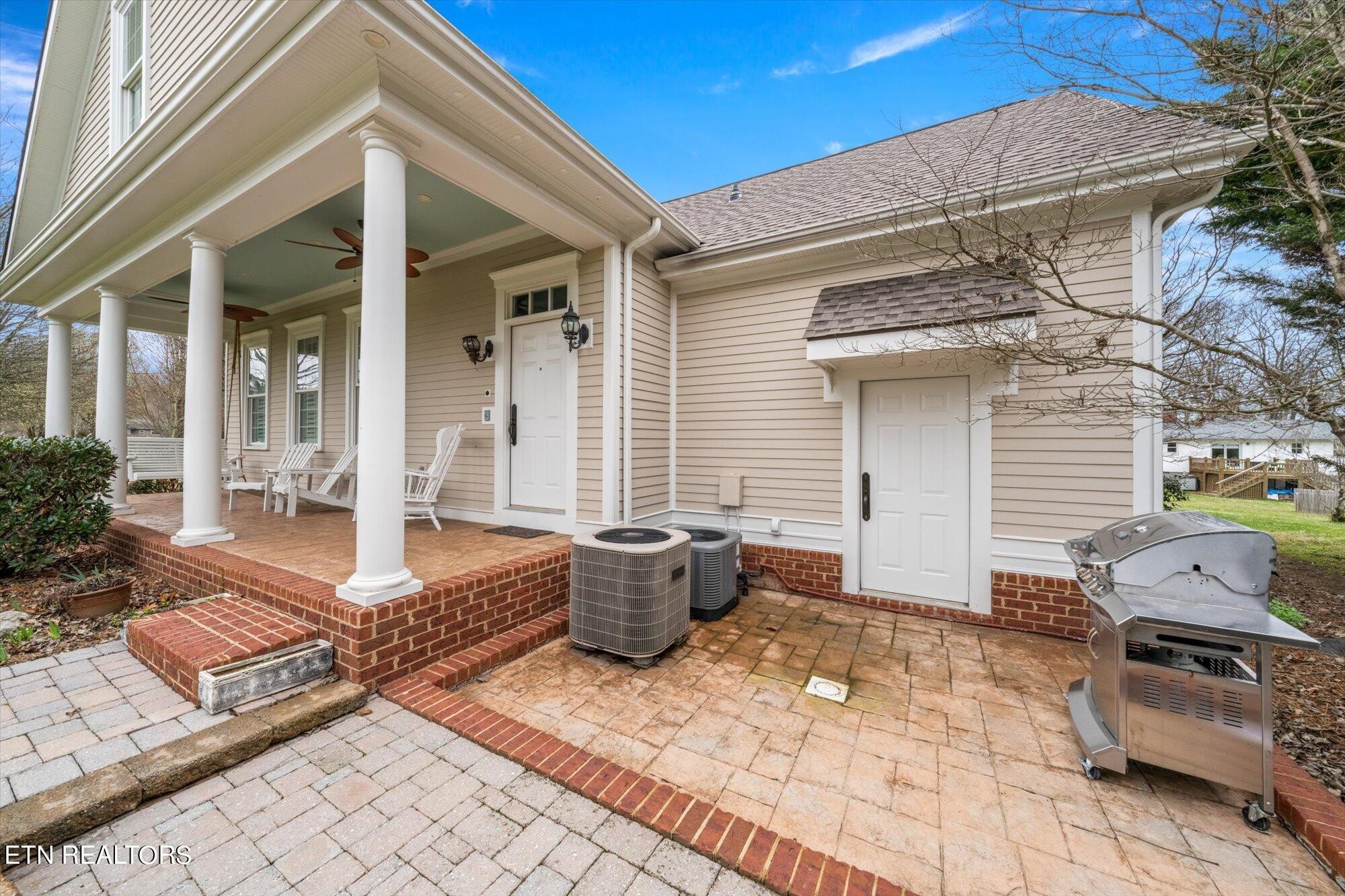 7016 Castlewood Road Knoxville, TN 37931 - Photo 45 of 58 a front view of a house with barbeque