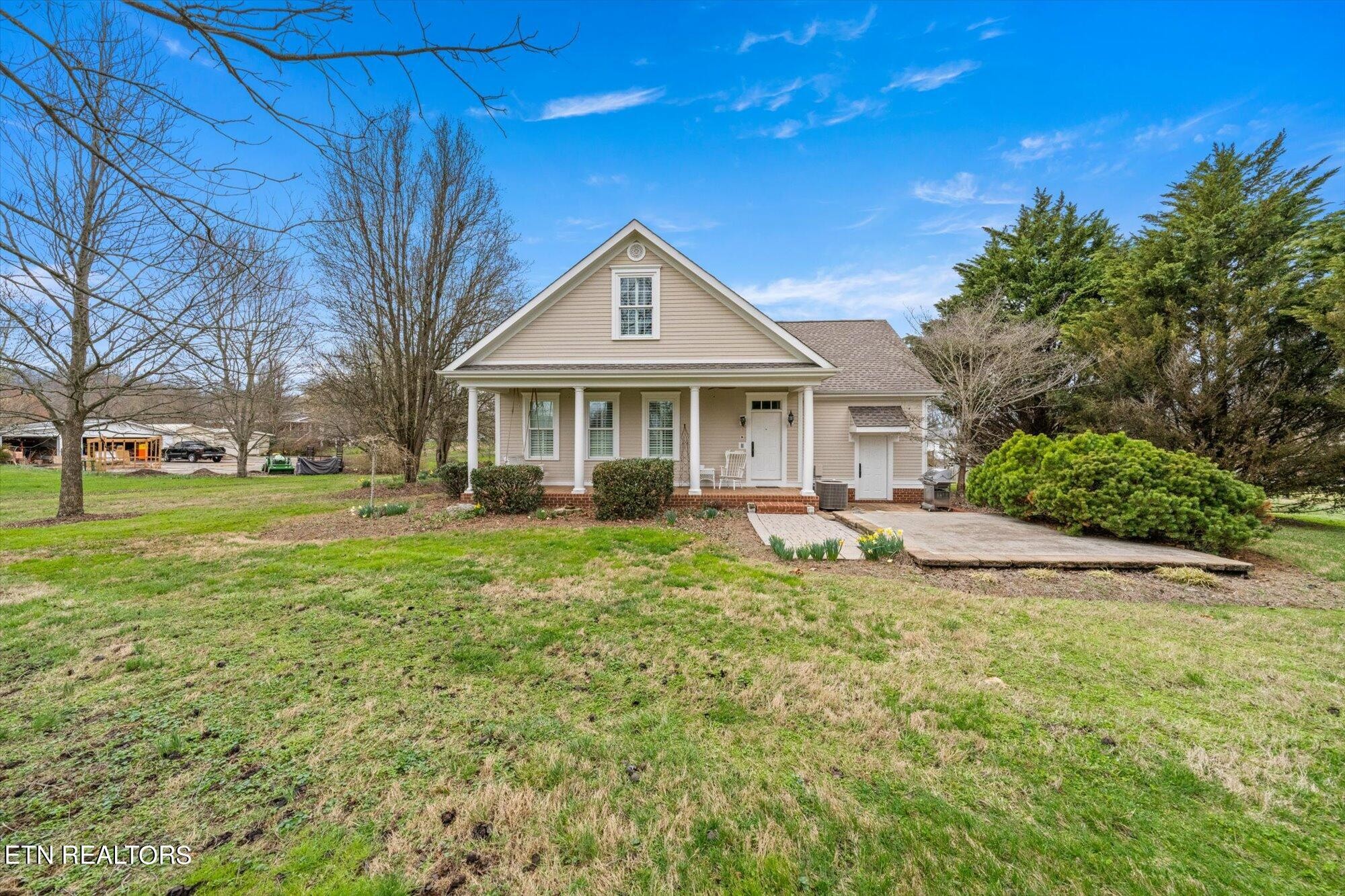 7016 Castlewood Road Knoxville, TN 37931 - Photo 48 of 58 a front view of a house with a yard