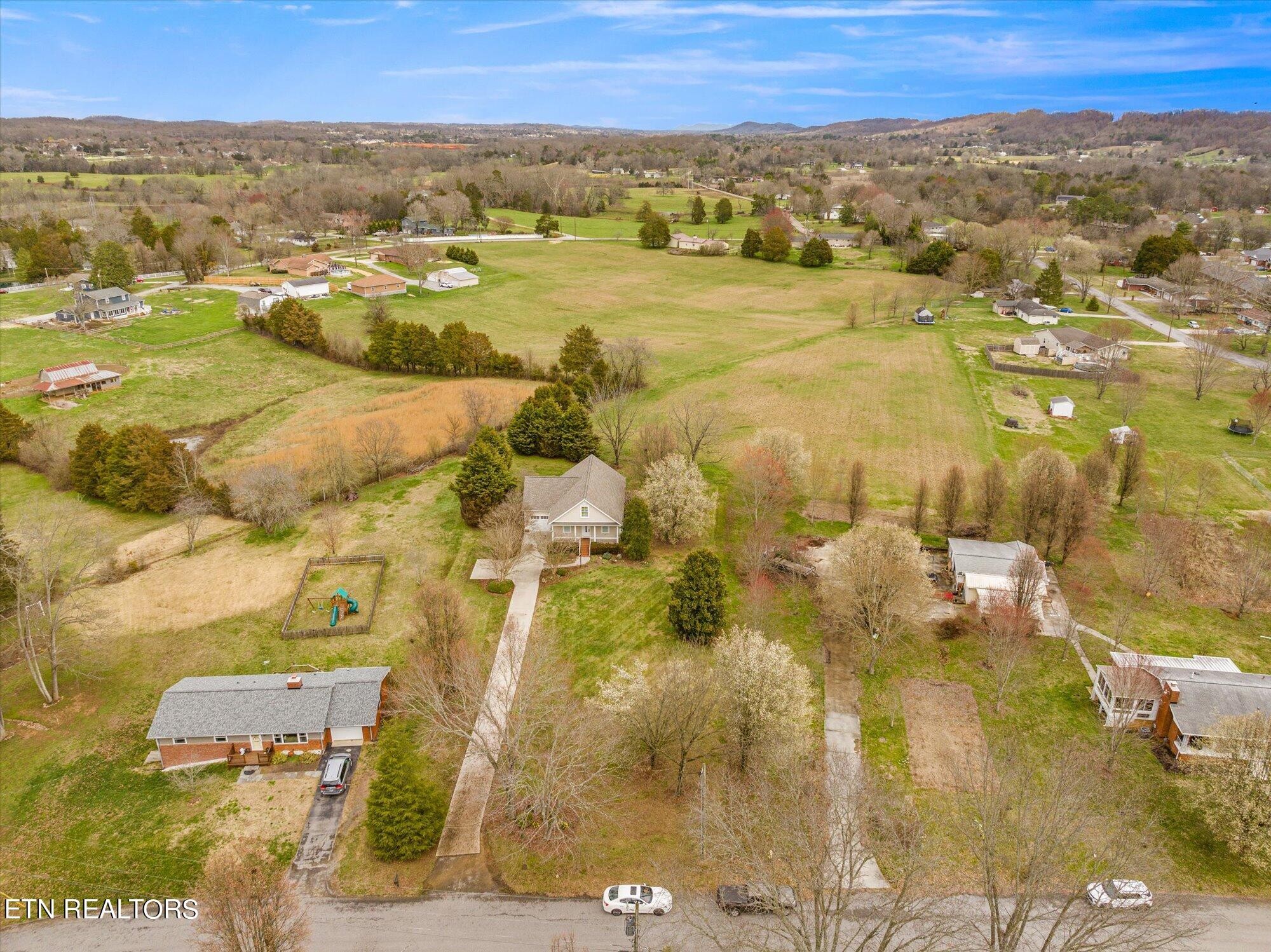 7016 Castlewood Road Knoxville, TN 37931 - Photo 54 of 58 an aerial view of residential houses with outdoor space