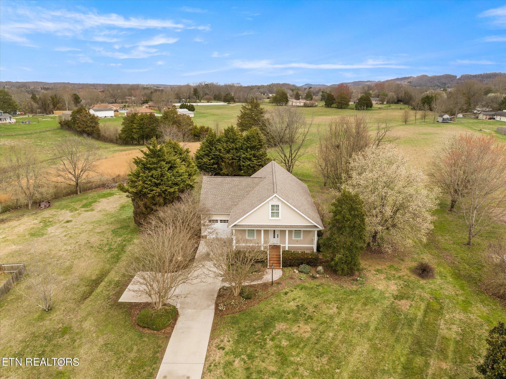 7016 Castlewood Road Knoxville, TN 37931 - Photo 58 of 58 a view of a lake with a mountain in the background