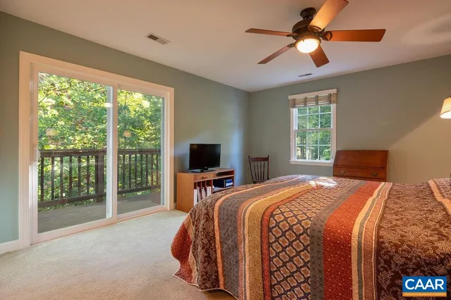 a bathroom with a double vanity sink mirror and shower