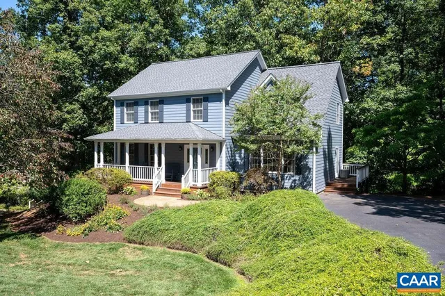 a front view of a house with patio