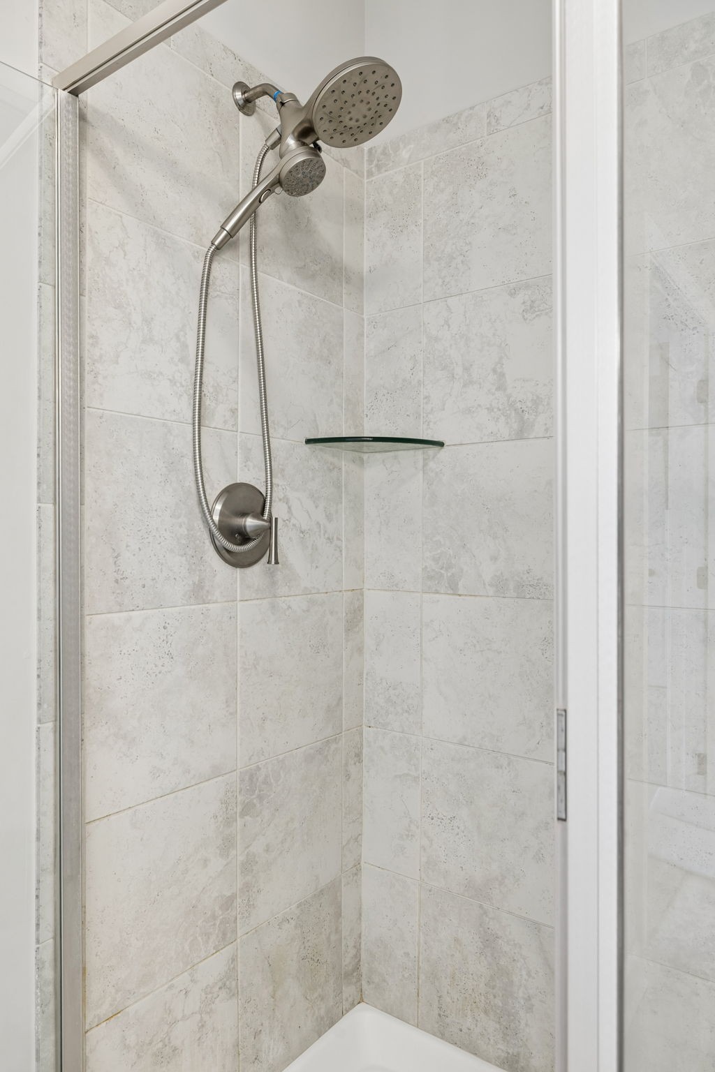 1002 Garrison Way Spring Hill, TN 37174 - Photo 49 of 63 a bathroom with a shower