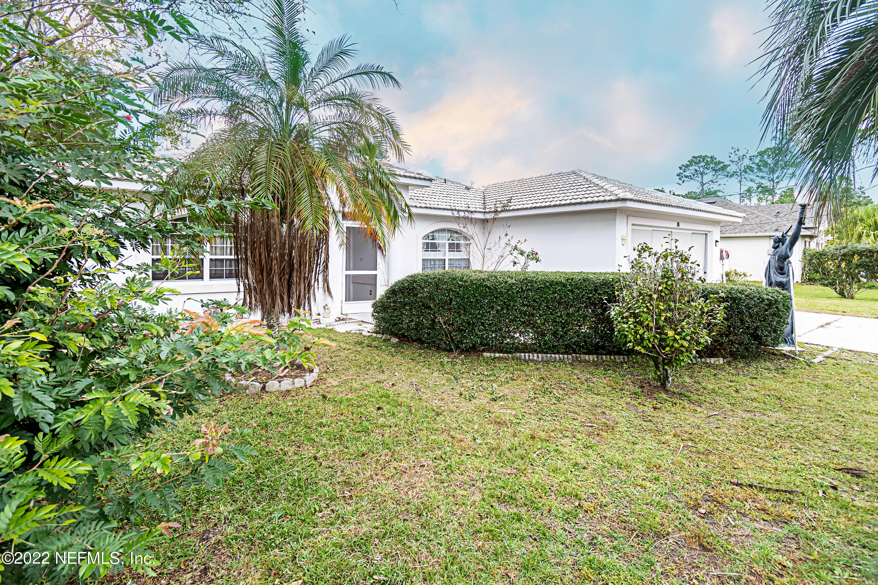 74 Raintree Place Palm Coast, FL 32164 - Photo 9 of 51 frontyard5