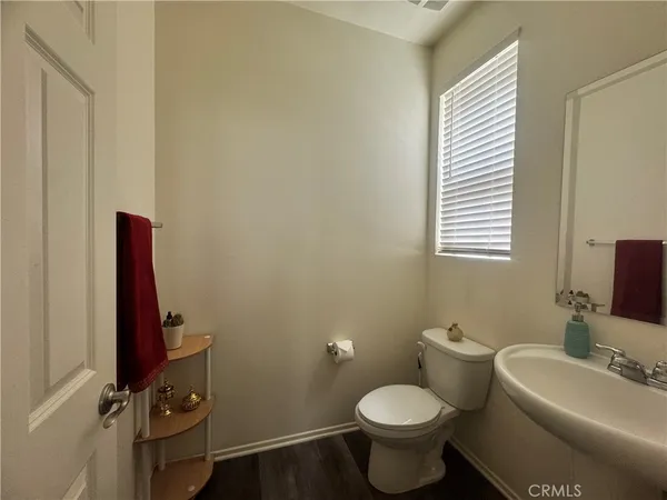 a bathroom with a toilet and a sink