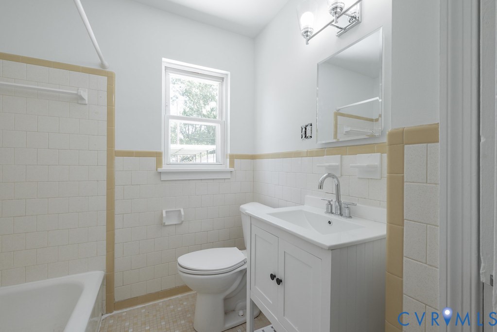 3400 Ryburn Road Richmond, VA 23234 - Photo 26 of 45 Bathroom featuring white subway tile walls with a