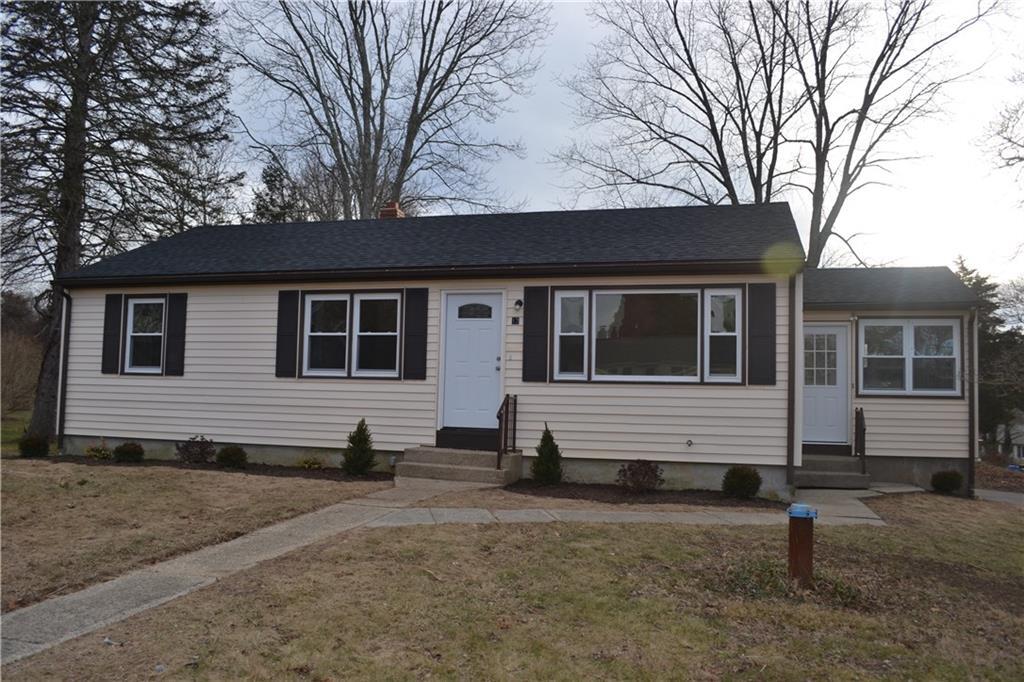 13 Michael Lane Ledyard, CT 06339 - Photo 1 of 1 a front view of a house with a yard