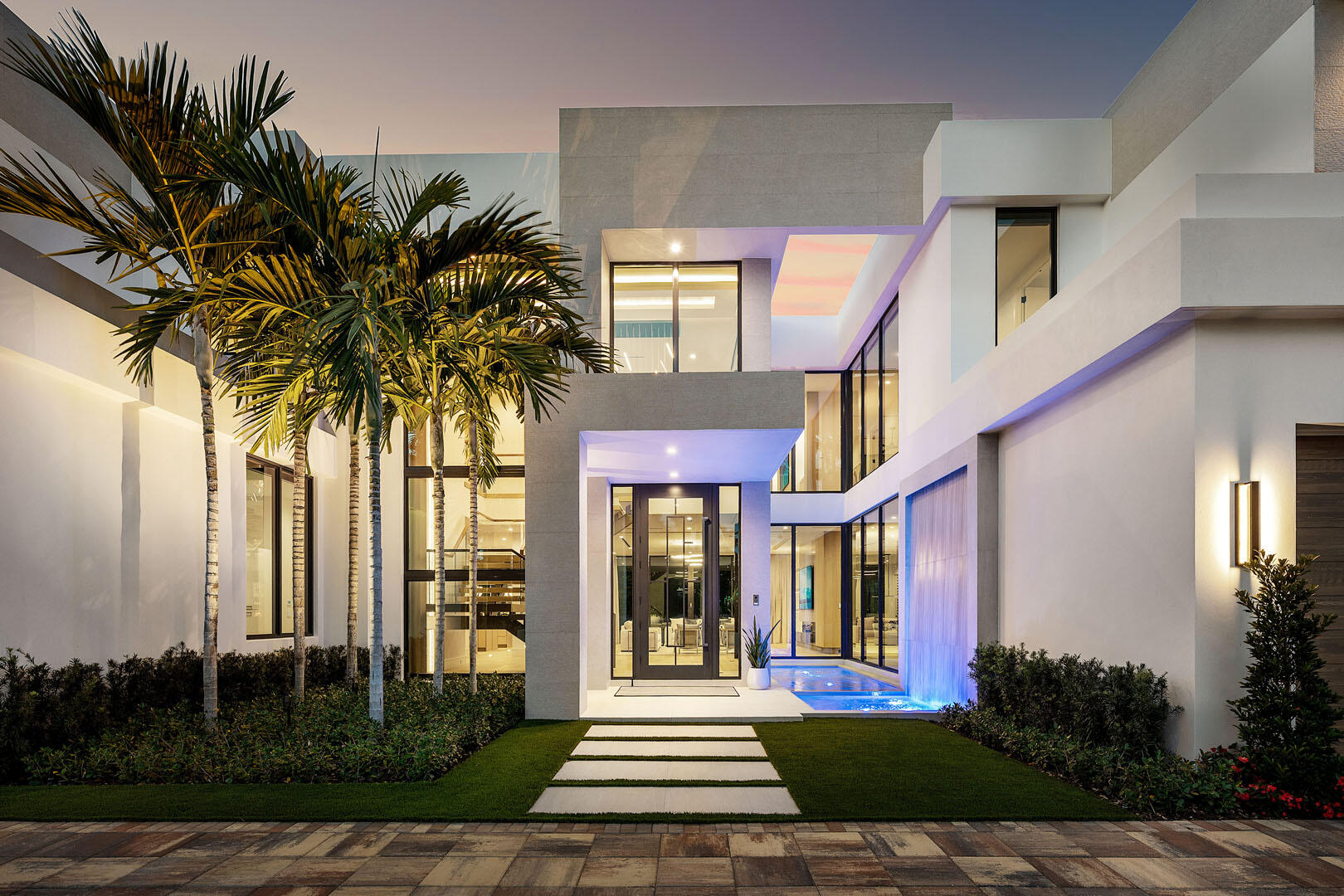 481 Thatch Palm Drive Boca Raton, FL 33432 - Photo 78 of 97 481_Thatch_Palm_Drive_Dusk_04