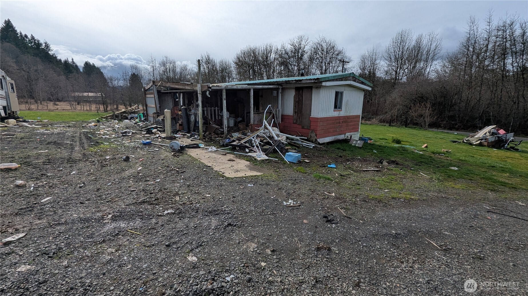 1493 Ferrier Road Winlock, WA 98596 - Photo 2 of 6 a view of a house with yard and sitting area