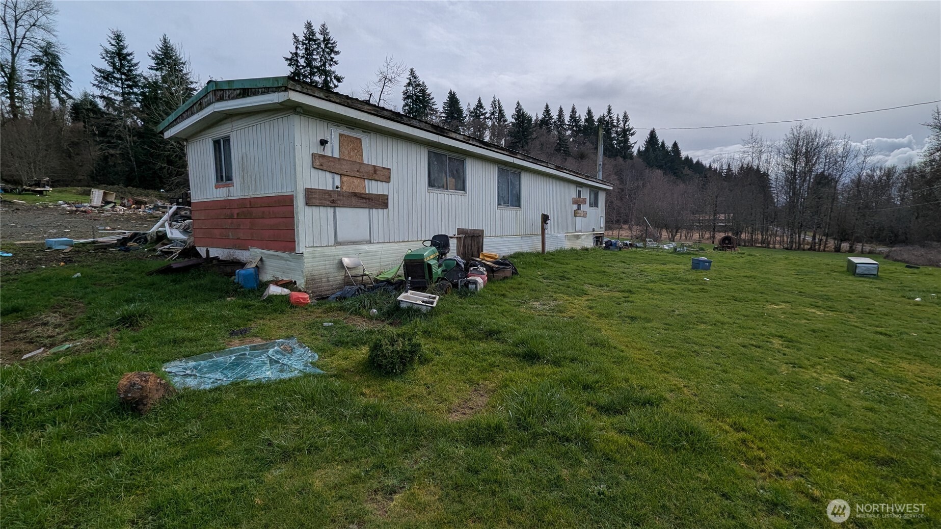 1493 Ferrier Road Winlock, WA 98596 - Photo 4 of 6 a backyard of a house with lots of green space