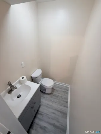 a bathroom with a sink and a toilet