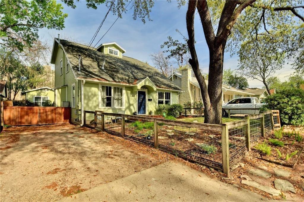 4412 Barrow Avenue, Unit A Austin, TX 78751 - Photo 1 of 28 View of front of property with a fenced front yard, a gambrel roof, and a gate