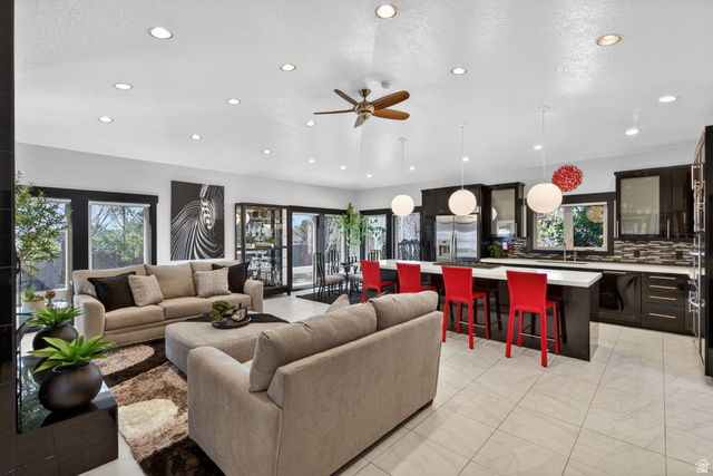 145 Carnesecca Court Mapleton, UT 84664 - Photo 40 of 109 Living room featuring ceiling fan and recessed lighting